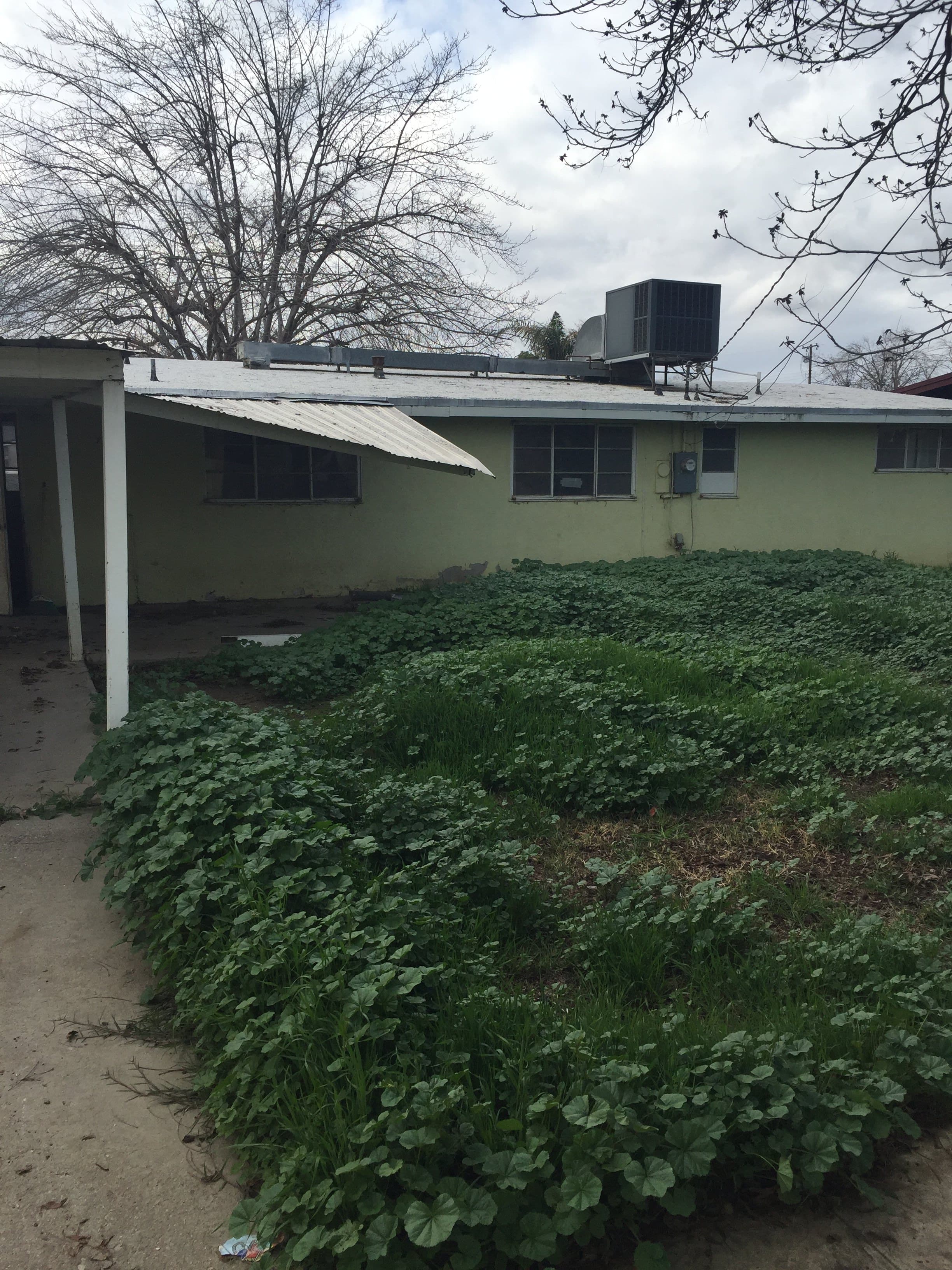 Garage of Orange Cove home we bought for cash